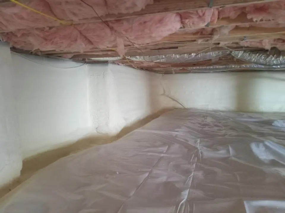 Crawl space encapsulation with closed-cell spray foam for Commercial Roof Restoration in Concord